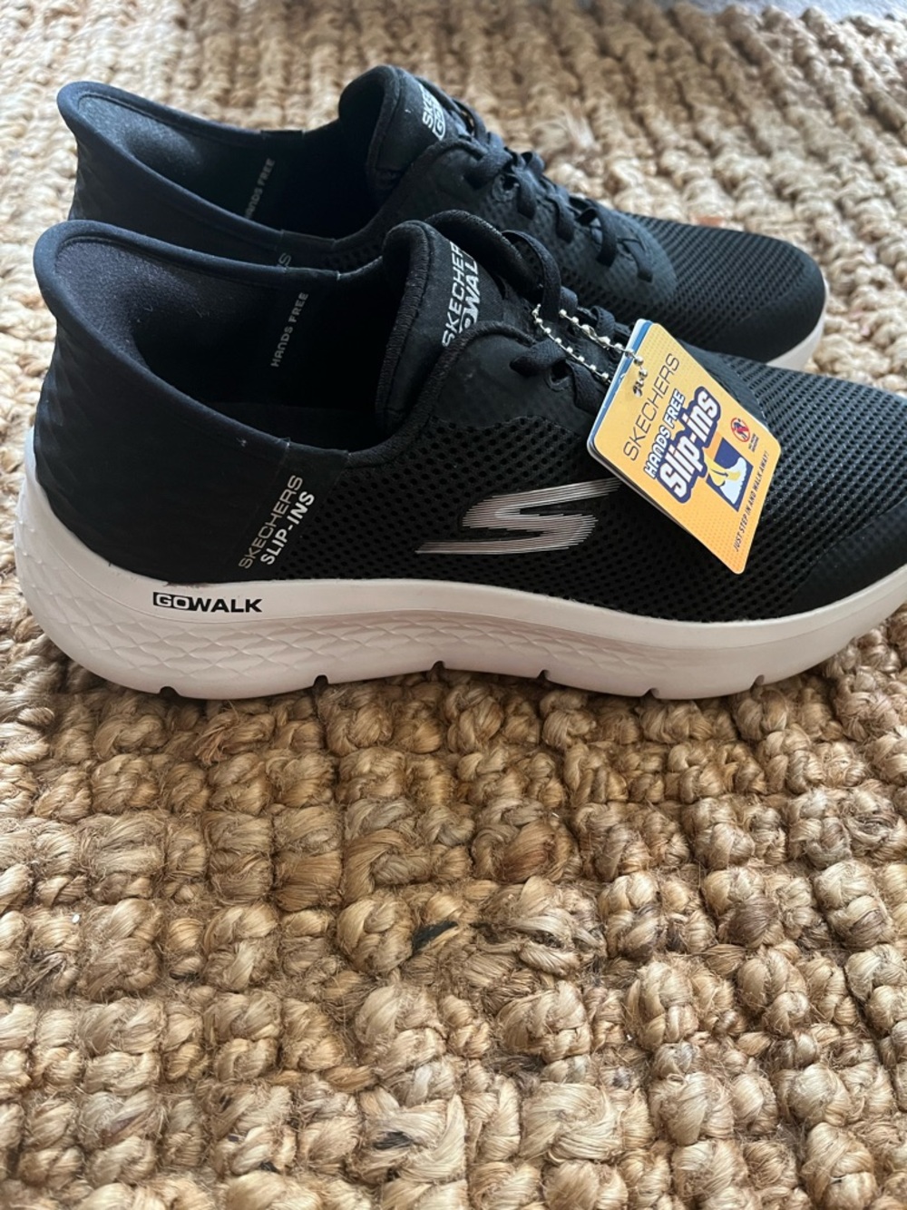 Skechers Black and White GOwalk Slip-On Athletic Sneakers
